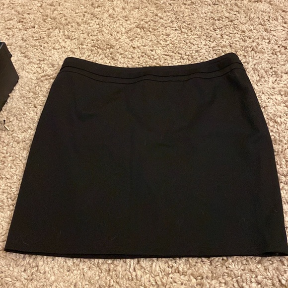 Black Gucci mini skirt with two silver GGs that rest on your back hips. With bag - Picture 10 of 10